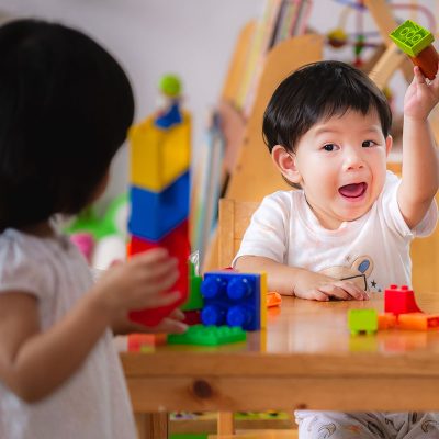 2 year old playing with blocks